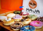 Maja Cafe + Donuts company logo